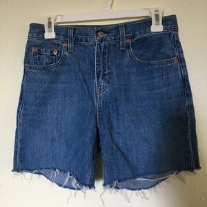 Levi's blue denim shorts. Size 25.